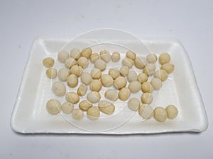 White sanghai beans in a white container