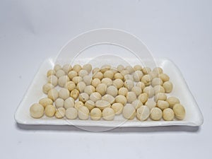 White sanghai beans in a white container