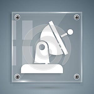 White Satellite dish icon isolated on grey background. Radio antenna, astronomy and space research. Square glass panels