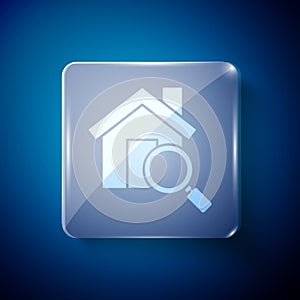 White Search house icon isolated on blue background. Real estate symbol of a house under magnifying glass. Square glass