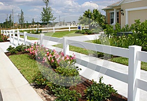 White security fence and flowers