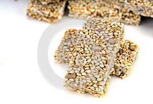 White seeds Bar, sweet snack on white background