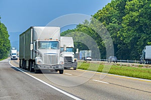 White Semis On The Interstate Highway with Copy Space