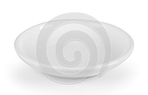 White seramic plate on white background