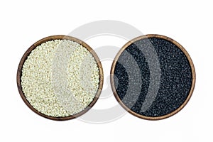 White sesame and black sesame seed on wooden coasters