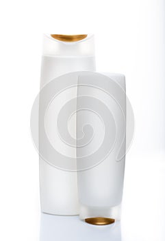 White shampoo bottles isolated on white. Path included.