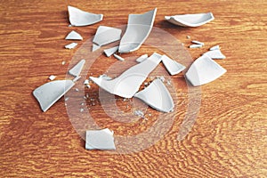 White Shards of a Broken Plate on the background. splinters