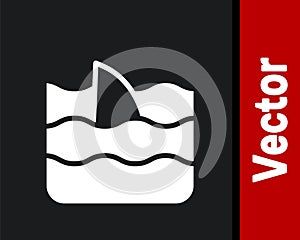 White Shark fin in ocean wave icon isolated on black background. Vector