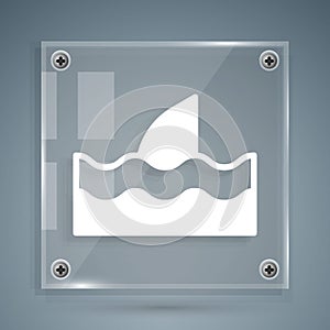 White Shark fin in ocean wave icon isolated on grey background. Square glass panels. Vector