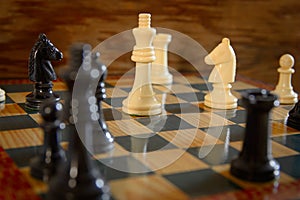 White sheets against blacks on chessboard photo