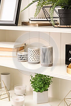 White shelving unit with decorative stuff