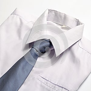 White shirt with blue tie