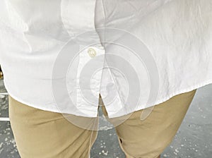 white shirt and brown pant outfit on normal day.