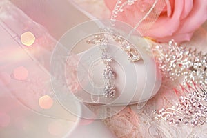 White shoes. wedding shoes. Bride`s high heels. The fees of the bride. Wedding jewelry.