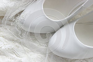 White shoes. wedding shoes. Bride`s high heels. The fees of the bride. Wedding jewelry.