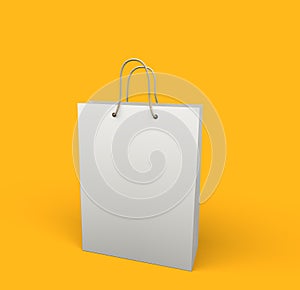 White shopping bag isolated on yellow background.