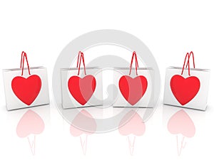 White shopping bags with red hearts