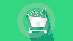 White Shopping cart and food icon isolated on green background. Food store, supermarket. 4K Video motion graphic