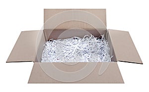 White shredding paper in cardboard crate isolated on white background with clipping path