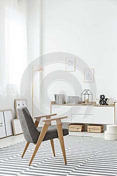 White sideboard in stylish interior photo