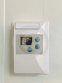 A White siemens digital thermostat at a hospital room