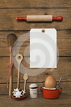White sign on an old wooden background with bakery christmas dec