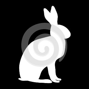 white silhouette of a rabbit or hare sitting on a black background.