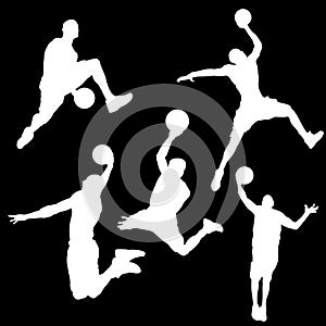 White silhouettes of a basketball player on a black background