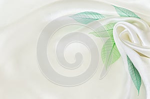 White silk background with flower drapery