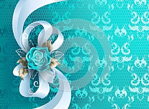 White silk bow on blue background