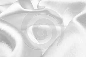 White silk texture luxurious satin for abstract background. beautiful white fabric