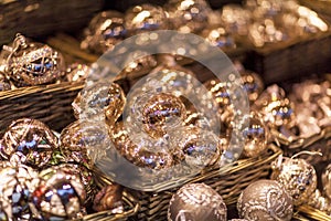 White and silver christmas tree ornaments and balls, advent market stall close up, photo