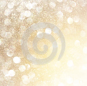 White silver and gold abstract bokeh lights. defocused background photo