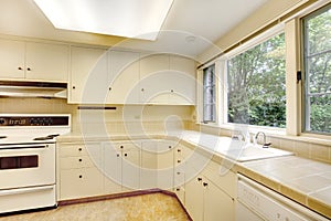 White simple old kitchen interior in American historical house.