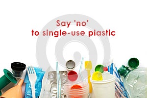 White single-use plastic and other plastic items on a white background