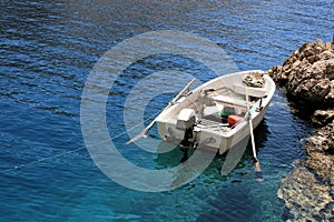 White sloop in the blue sea of the Zavratica bay in Croatia