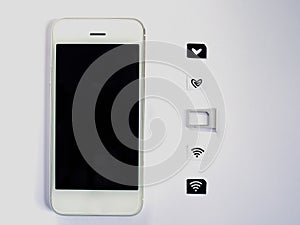 A white smart phone, sim card tray and small paper simulated as