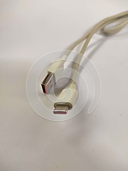 white smartphone usb cable