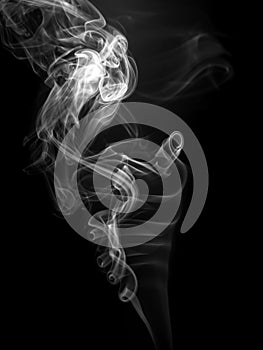 White smoke abstract on black background, toxic movement in dark