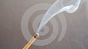 White smoke from aromastick or aromatic stick