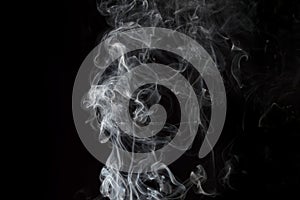 White smoke on black background