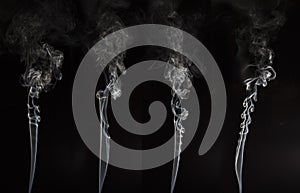 White smoke on black background