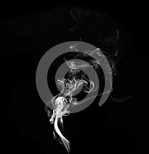 White smoke on black background