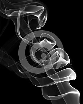 White smoke on a black background. Abstract artistic design