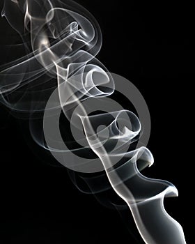 White smoke on a black background. Abstract artistic design