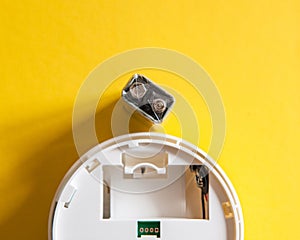 White smoke detector with nine volt battery