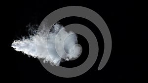 White smoke wave on an isolated black studio background