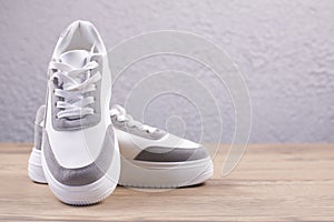 White sneakers on the background. Sports shoes sneakers.