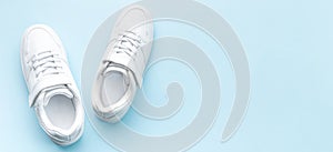 White sneakers on a blue background