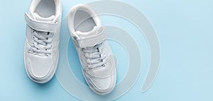 White sneakers on a blue background